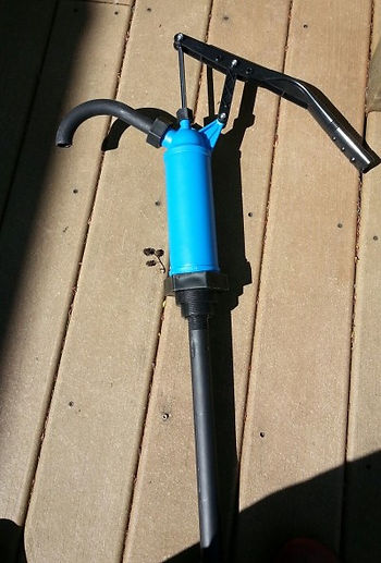 Plastic pump for water barrel.